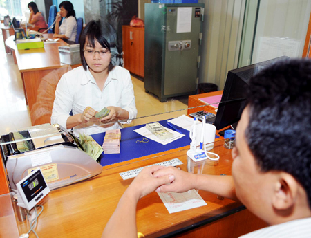 Quý III Lượng tiền giả thu giữ giảm 23 so với cùng kỳ năm 2014